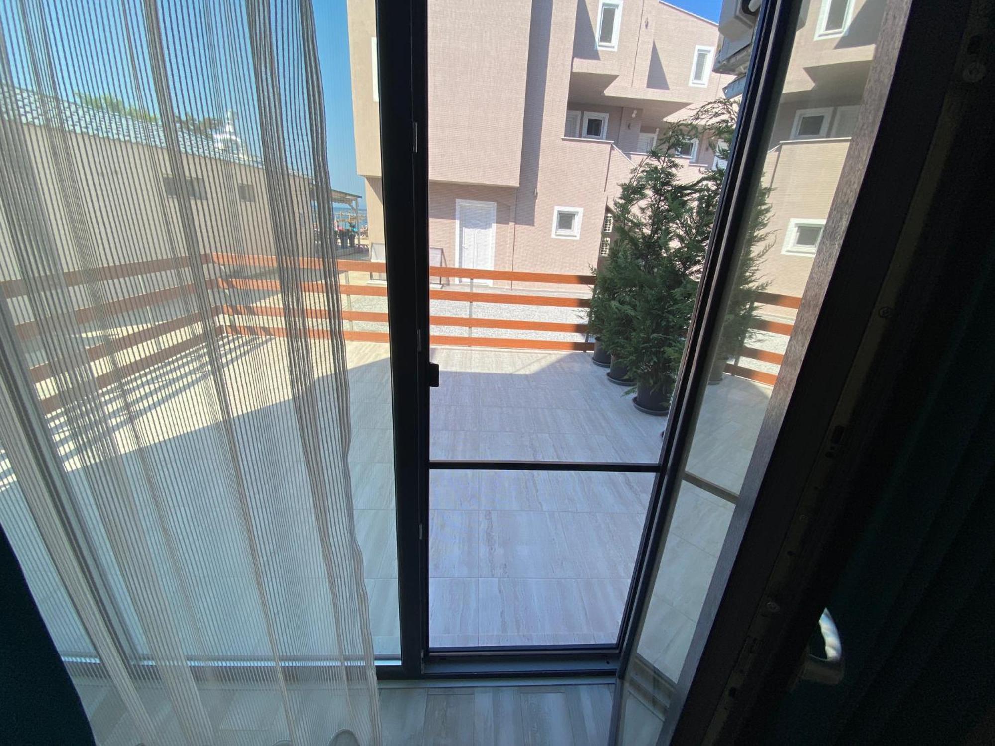 Opalium Beach Front Suites Potos Esterno foto